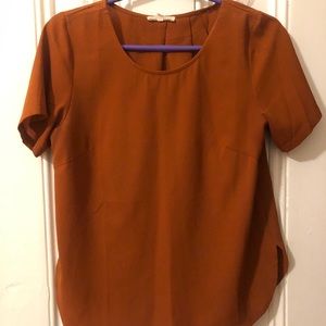 Burnt orange blouse